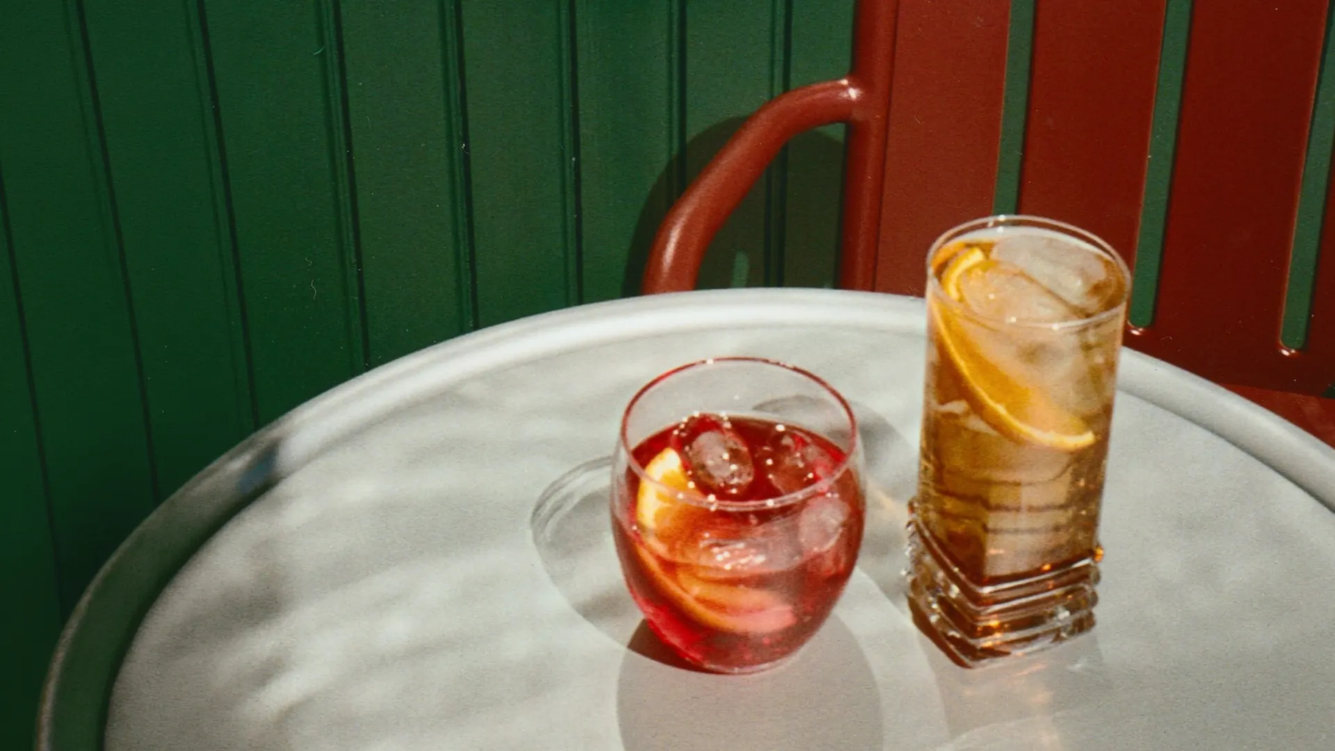 Two colourful drinks on a sunlit table at Villa Hesnæs.